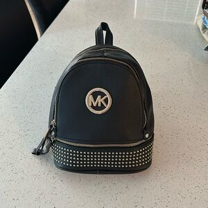 Michael Kors mini backpack, leather.